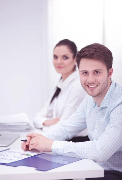 Business people working together at desk, white background — Stock Photo, Image