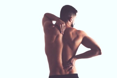 Onun boyun ağrısı tutan genç adam. Tıp kavramı