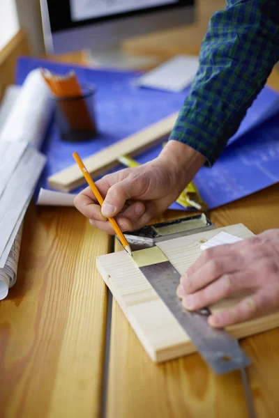 Architect working on drawing table in office — Stock Photo, Image