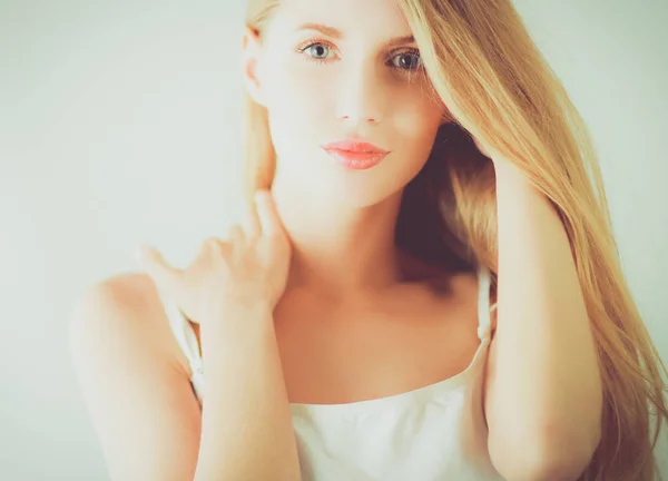 Portrait of beautiful woman isolated on gray background — Stock Photo, Image