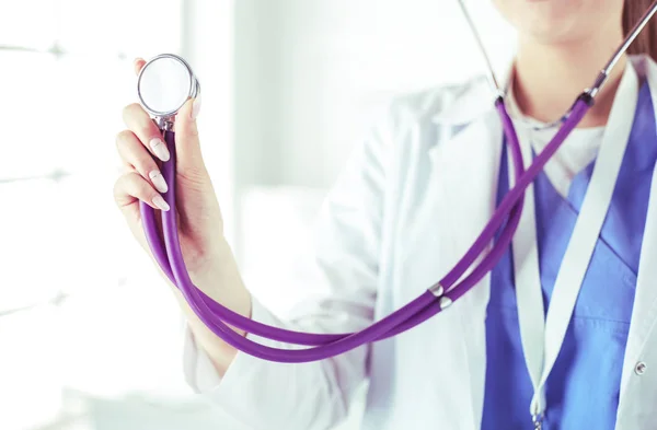 Smiling medical doctor woman with stethoscope in hospital — Stock Photo, Image