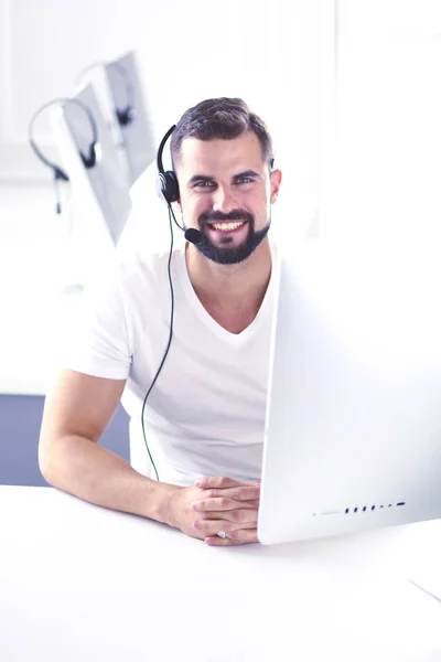 Businessman in the office on the phone with headset, Skype — Stock Photo, Image