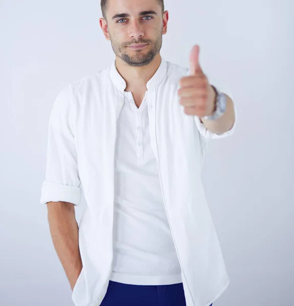 Young business man standing isolated on white background. — Stock Photo, Image