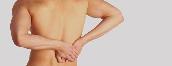 Joven sosteniendo su cuello con dolor. Concepto médico —  Fotos de Stock