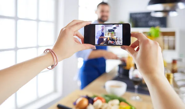 Portrait of handsome man filming cooking show or blog — Stock Photo, Image