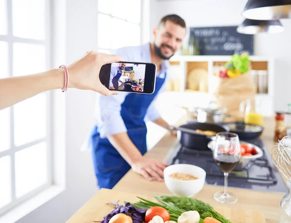 Portrait of handsome man filming cooking show or blog — Stock Photo, Image