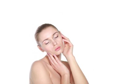 Yüzüne dokunan güzel bir spa kadını portresi