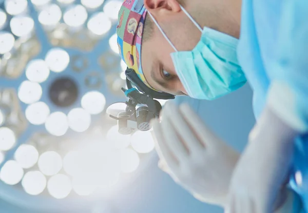 Male surgeon on background in operation room — Stock Photo, Image