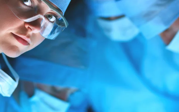 Young surgery team in the operating room — Stock Photo, Image