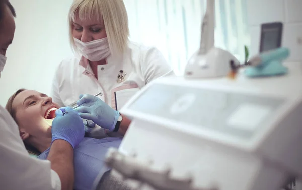 Doctor and patient in the dental clinic