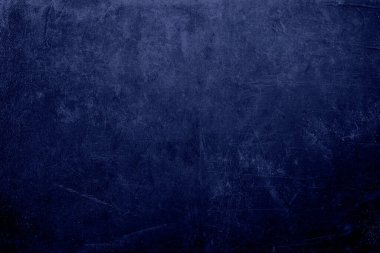 Huysuz mavi duvar arkaplanı veya dokusu 