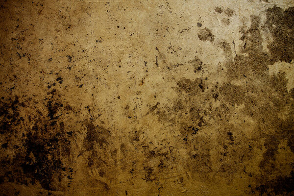 Golden goldleaf grungy backdrop with texture 