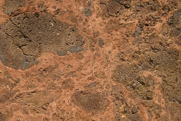 红熔岩火山岩壁纹理细部 — 图库照片