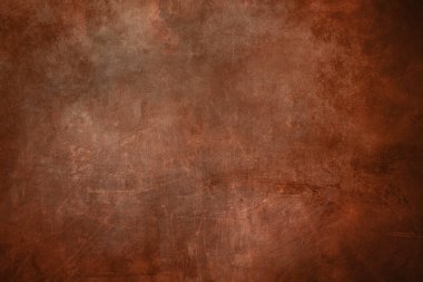 Kırmızı renkli metalik kazınmış duvar dokusu veya arkaplanı 