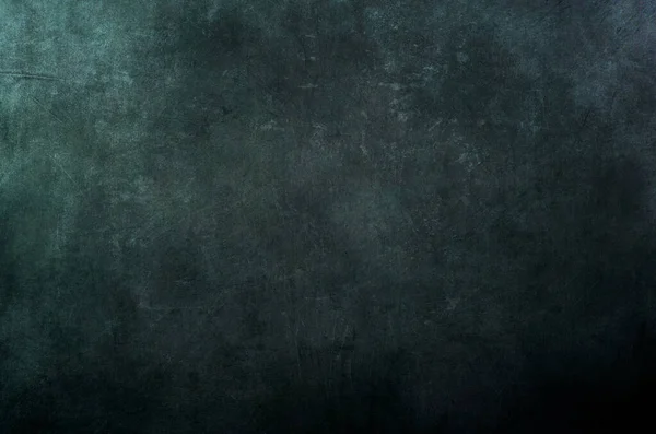 Koyu yeşil kazınmış duvar pasaklı arkaplan veya doku 