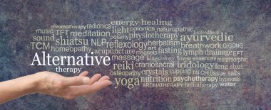 Alternative Therapy Word Cloud - female hand held palm up the words ALTERNATIVE THERAPY in white above surrounded by a relevant word cloud on a rustic dark stone background clipart