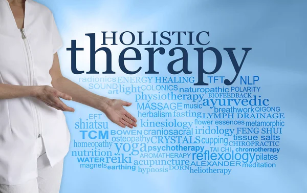 Take a look at all the different Holistic therapies - female therapist with hands gesturing towards HOLISTIC THERAPY word tag cloud on a turquoise blue background