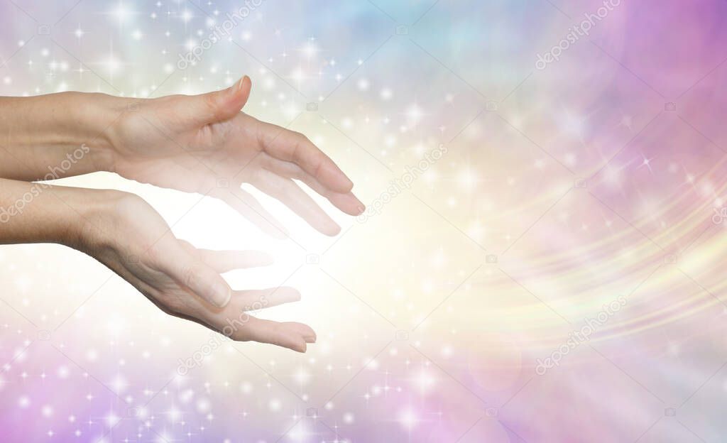 I am sharing pure healing energy with you - female healer sending out beautiful angelic energy against pale pink yellow blue background with space for messages 