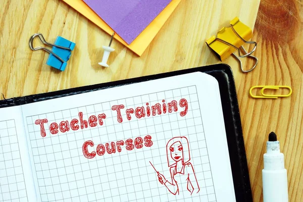 Educational concept about Teacher Training Courses with sign on the page.