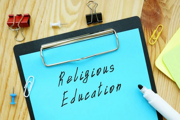 Business concept about Religious Education with sign on the piece of paper.