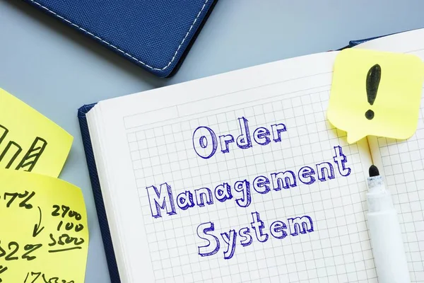 Business concept about Order Management System (OMS) with inscription on the sheet.