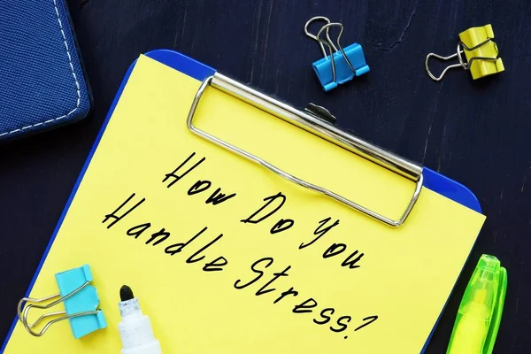 Business concept about How Do You Handle Stress? with sign on the sheet.
