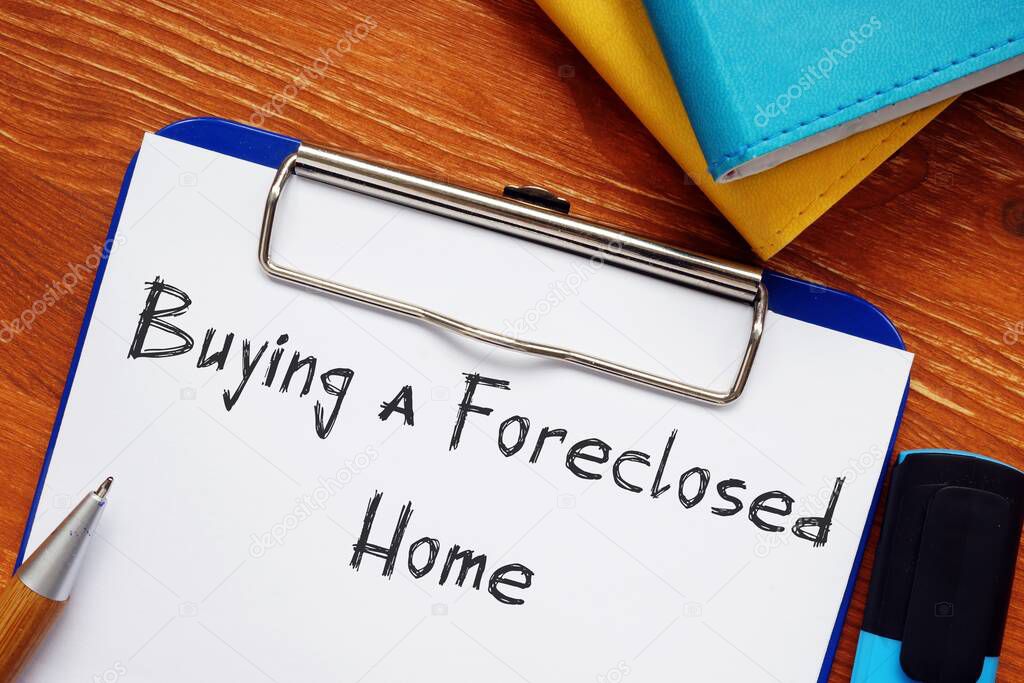 Business concept about Buying a Foreclosed Home with phrase on the page.
