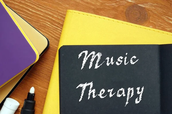 Motivation concept meaning Music Therapy with phrase on the piece of paper.