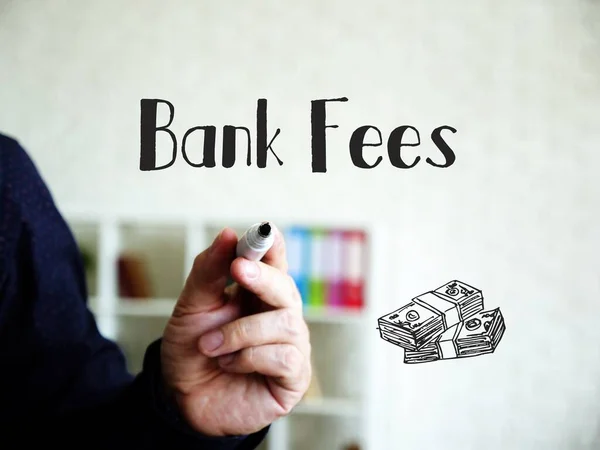 Financial concept meaning Bank Fees with inscription on the sheet.