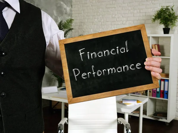 Conceptual photo about Financial Performance with handwritten phrase.