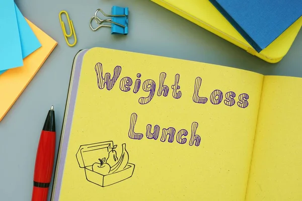Healthy concept meaning Weight Loss Lunch with phrase on the sheet.