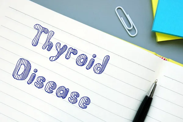 Thyroid Disease sign on the piece of paper.