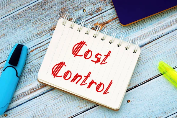 Business concept about Cost Control with inscription on the sheet