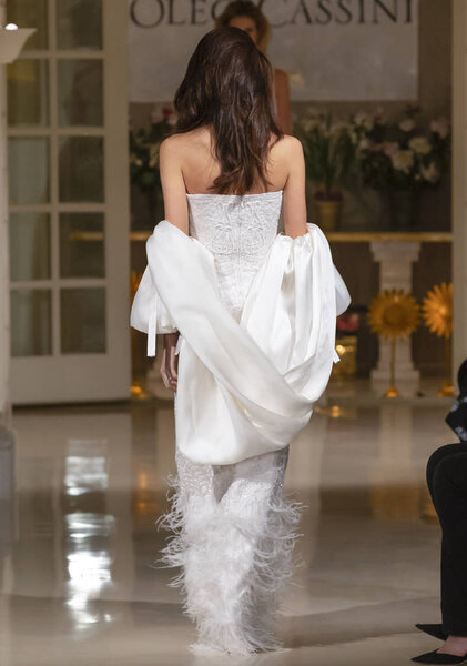 NEW YORK, NY - April 12, 2018: A model walks the runway at the Oleg Cassini Bridal Spring 2019 Collection Runway Show during NY Fashion Week Bridal