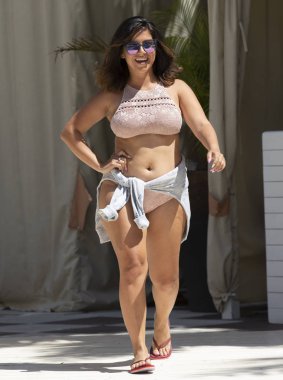 MIAMI BEACH, FL - July 14, 2018: A model walks the runway at the Aerie Swim Show during the Paraiso Fashion Fair at the Plymouth Hotel clipart