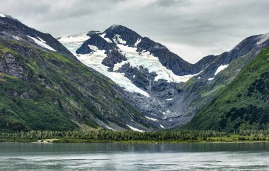 A view of the Portage Glacier and Portage Lake on Kenai Peninsula, Alaska clipart