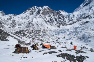 EVEREST BASE CAMP, NEPAL - CIRCA OCTOBER 2013: expedition at Everest Base Camp  circa October 2013 in Everest Base Camp. clipart