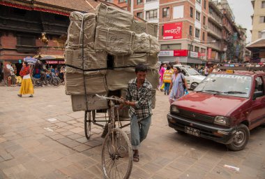 Rickshaw, Ekim 2013 'te Katmandu' da Nepal 'de çok popüler bir toplu taşıma aracıdır..
