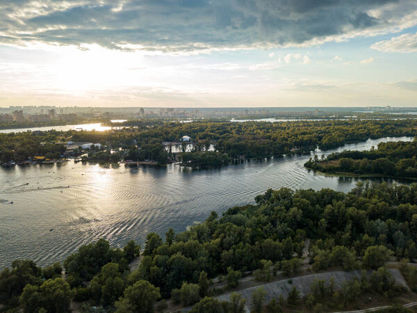 Sunset over the river Dnieper in Kiev. Aerial drone view.