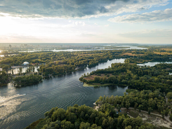 Sunset over the river Dnieper in Kiev. Aerial drone view.