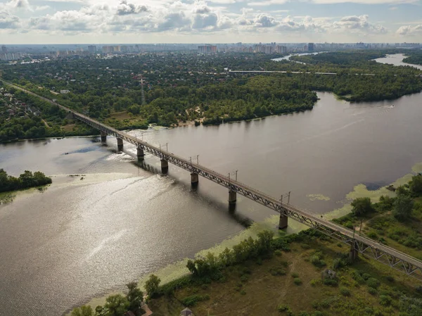 Aerial drone view. Railway bridge over the Dnieper river in Kiev.