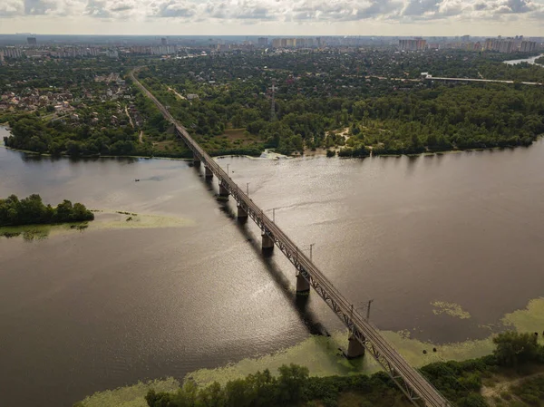 Aerial drone view. Railway bridge over the Dnieper river in Kiev.