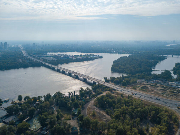 Aerial drone view. North bridge in Kiev and the Dnieper river on a clear summer morning.