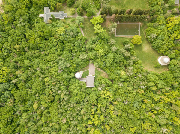 Aerial drone view. Buildings in the forest in Kiev.
