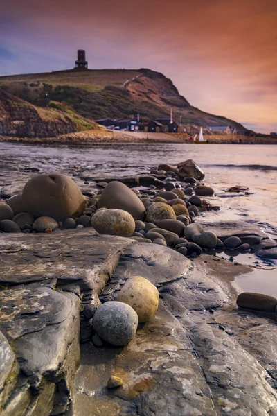 Kimmeridge sunset, rocks and reflections — Stock Photo, Image