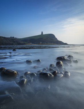 Kimmeridge çıkıntıları Dorset'deki / daki gün batımında