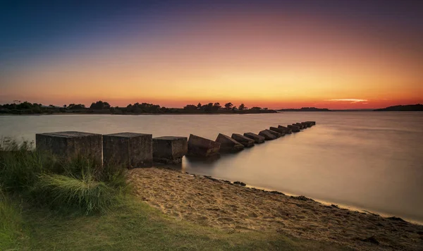 Dragon's Teeth sea defences in Poole Harbour — Stock Photo, Image