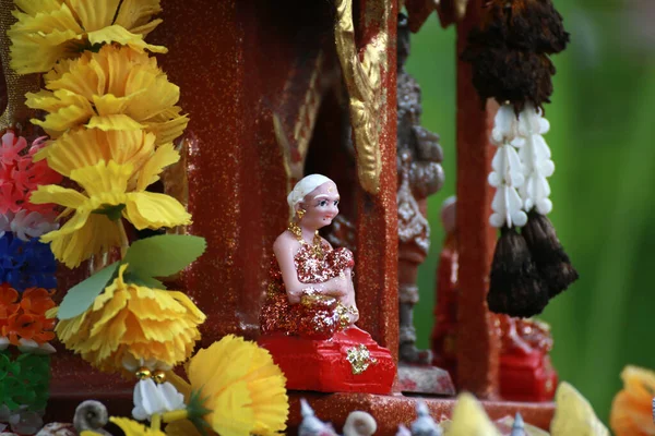 Thai traditional dolls in thai spirit house, doll used to make a votive offering to supernatural Holy thing. native Thai culture, Thailand