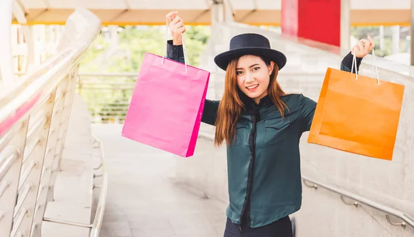 Happy woman with shopping bags enjoying in shopping. women shopping, lifestyle concept