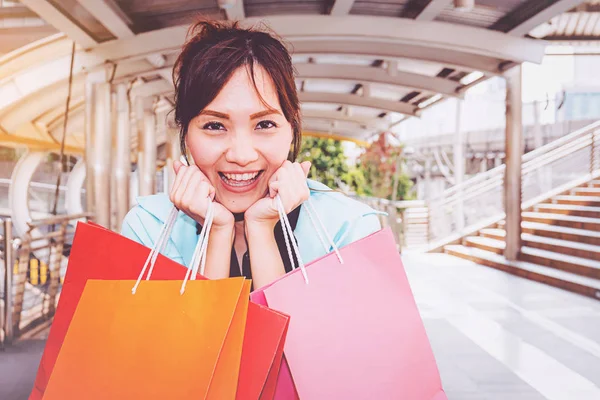 Happy woman with shopping bags enjoying in shopping. women shopping, lifestyle concept